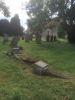 Damaged grave stones of John & Florence CULBERTSON, Arthur CULBERTSON & Christopher CULBERTSON lying on the ground after tree fell on them