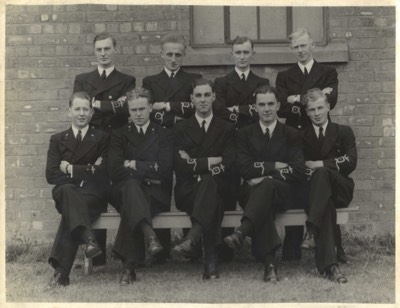  Lt (?) J M Culbertson RNVR 2nd from right front row. Pilot training course in Canada? 