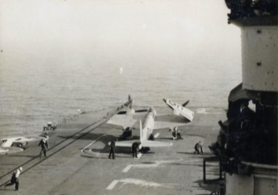  Mosquito landed on aircraft carrier. Wings folded on lift to go to hanger below deck 5 of 5 