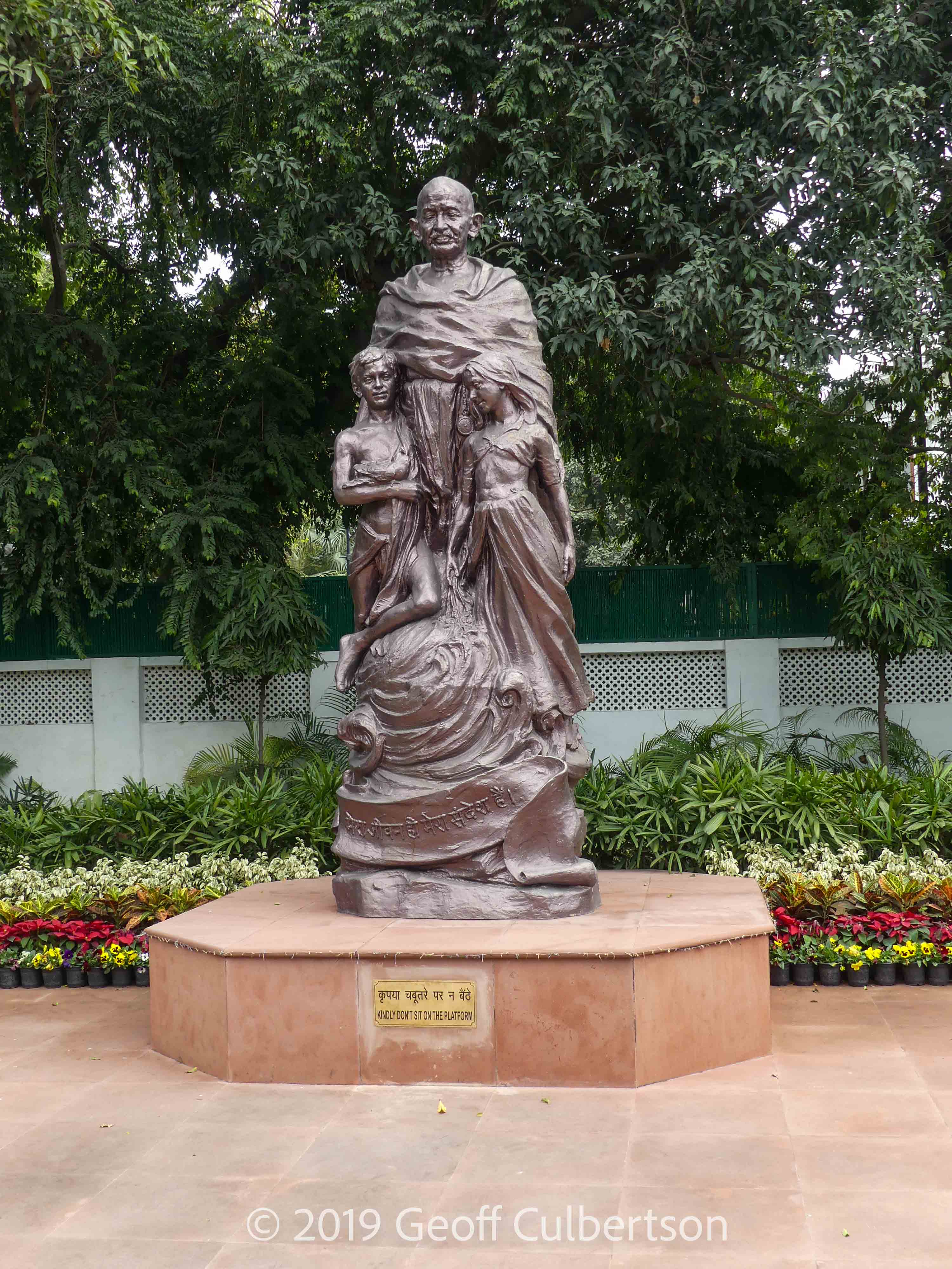 Statue of Gandhi with children