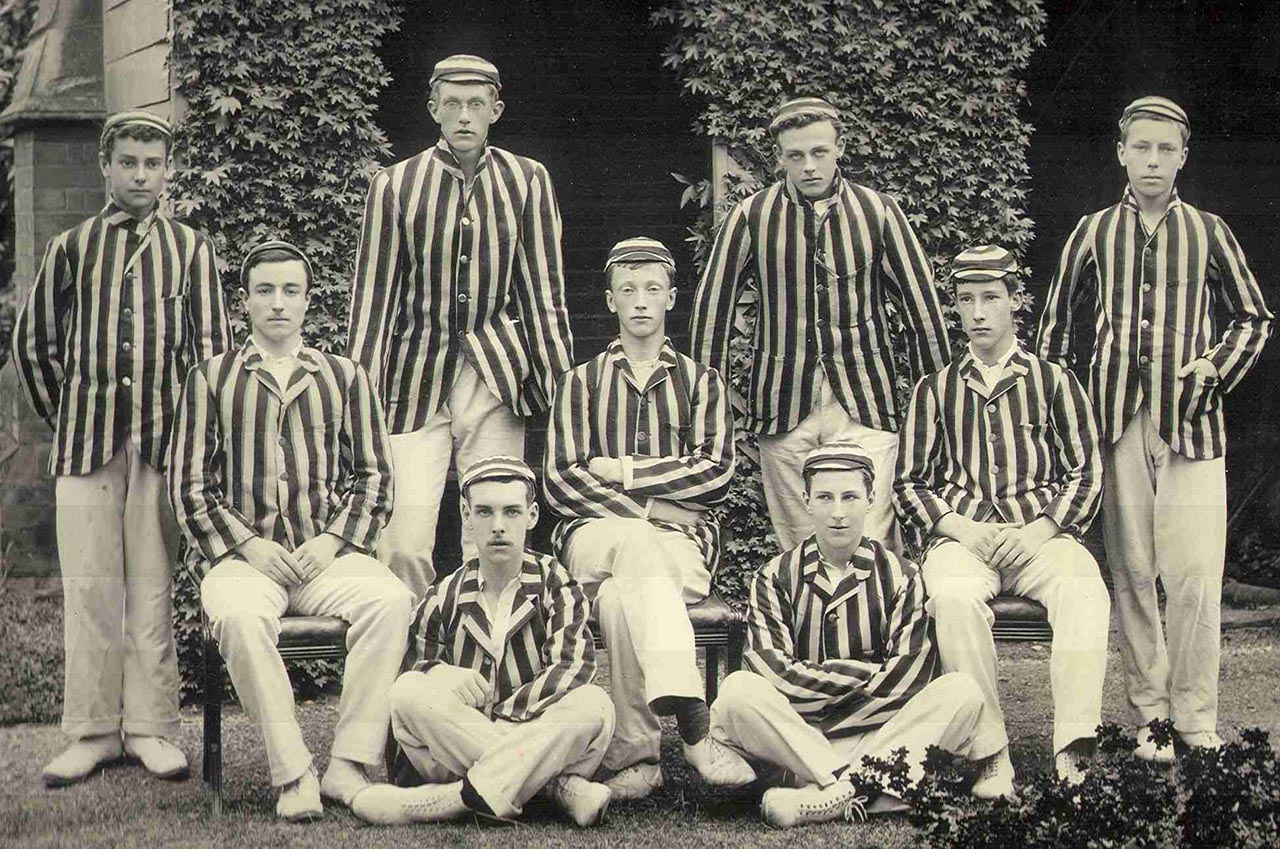 1901 - Photograph of 1st XI Cricket team - JMS Culbertson sitting x-legged on left